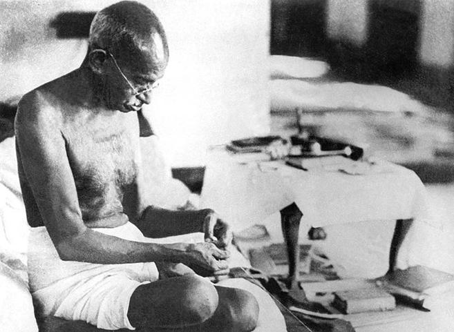 https://upload.wikimedia.org/wikipedia/commons/thumb/1/14/Gandhi_spinning_1942.jpg/800px-Gandhi_spinning_1942.jpg